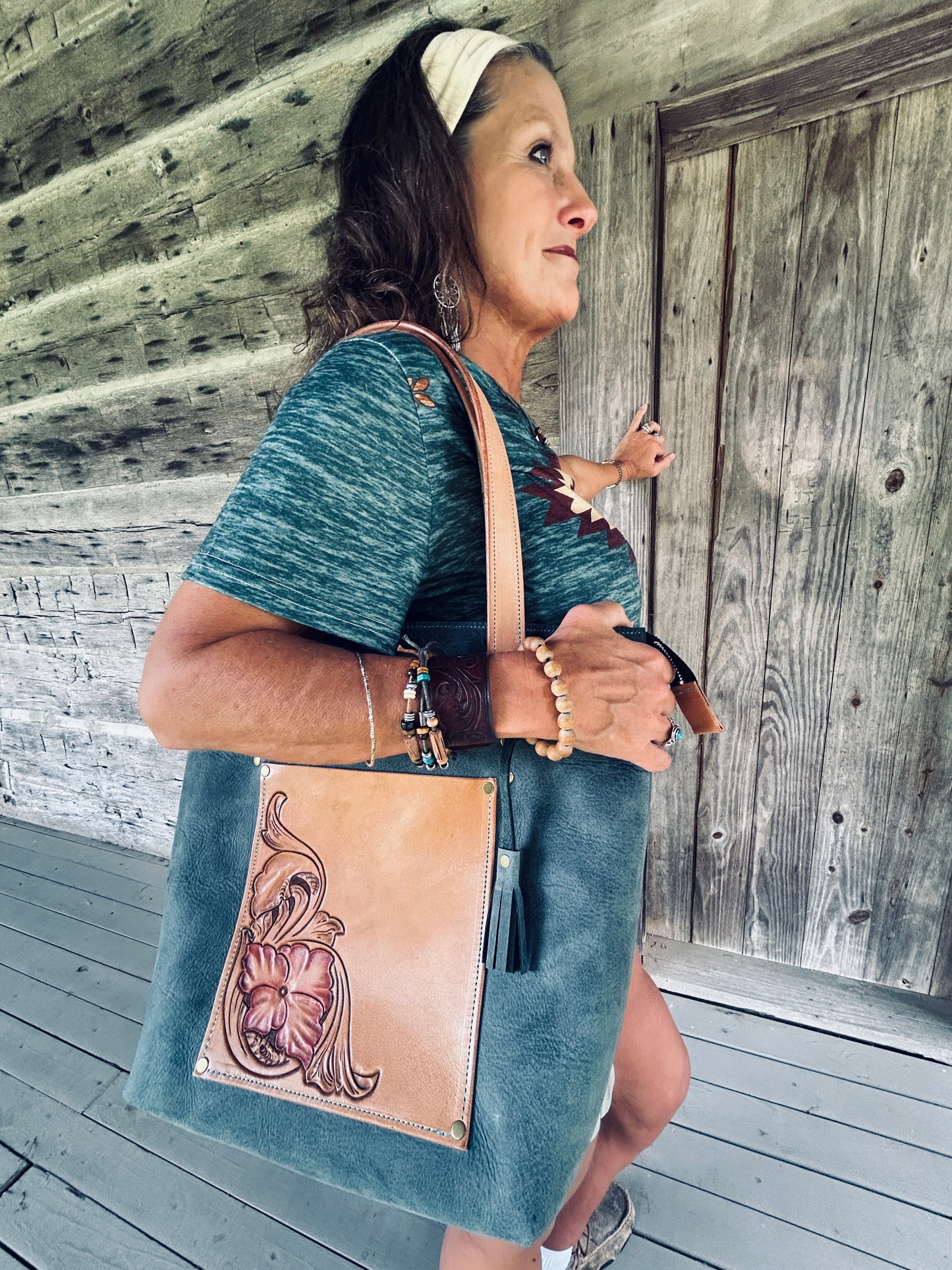 Zippered leather tote with tooling and interior pockets